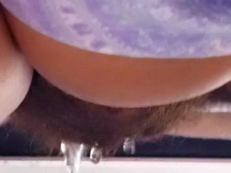 Woman pissing on woman